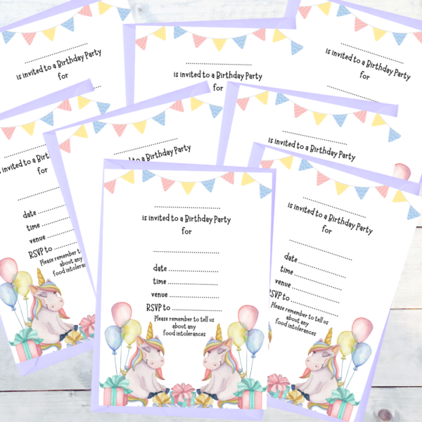 Unicorn Party Invitations displayed on whitewashed boards